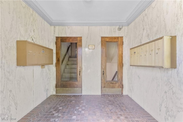 2472 Overlook Rd Unit 11, Cleveland Heights, OH 44106 - unfurnished room featuring mail area, ornamental molding, and stairs