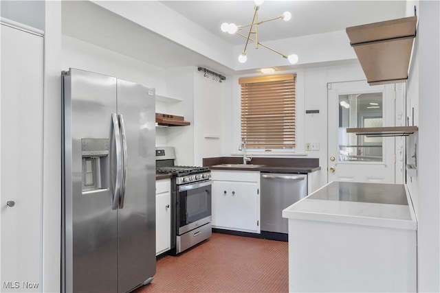 2472 Overlook Rd Unit 11, Cleveland Heights, OH 44106 - kitchen with stainless steel appliances, a sink, open shelves, under cabinet range hood, and white cabinets