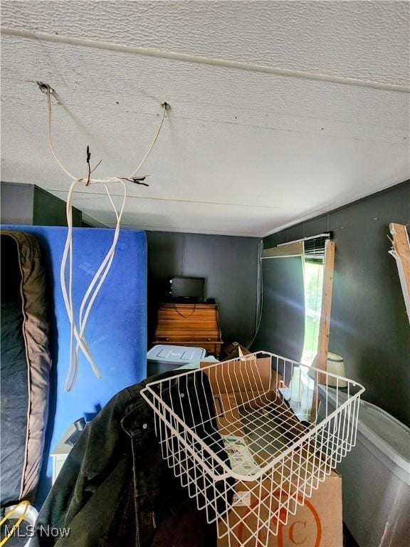 6960 Bluebell Rd, Cumberland, OH 43732 - bedroom with a textured ceiling