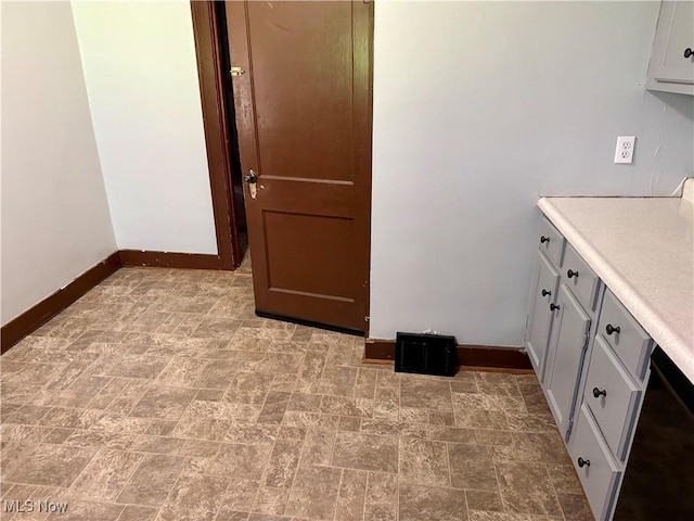237 Beech Rd, Weirton, WV 26062 - interior space featuring baseboards, light countertops, and black dishwasher