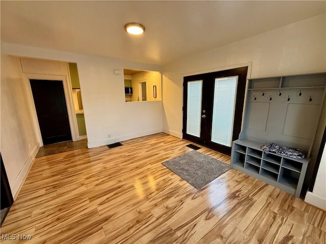 610 N 5th St, Cambridge, OH 43725 - entryway with wood finished floors and baseboards