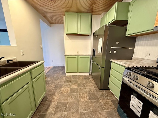610 N 5th St, Cambridge, OH 43725 - kitchen featuring green cabinets, appliances with stainless steel finishes, a sink, light countertops, and wood ceiling