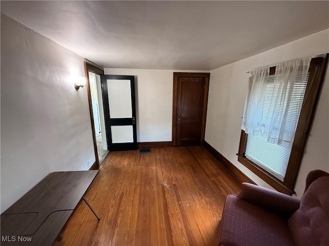 610 N 5th St, Cambridge, OH 43725 - unfurnished room featuring wood finished floors and baseboards