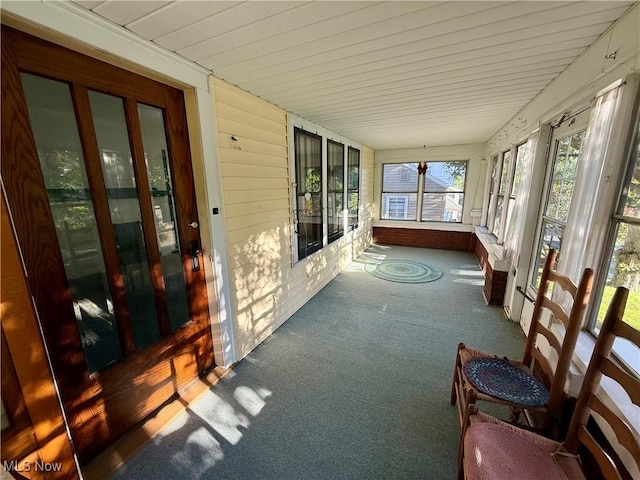 610 N 5th St, Cambridge, OH 43725 - unfurnished sunroom with carpet flooring and wood ceiling