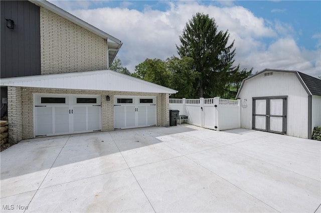 4184 Meadowview Dr NW, Canton, OH 44718 - garage featuring a gate and driveway