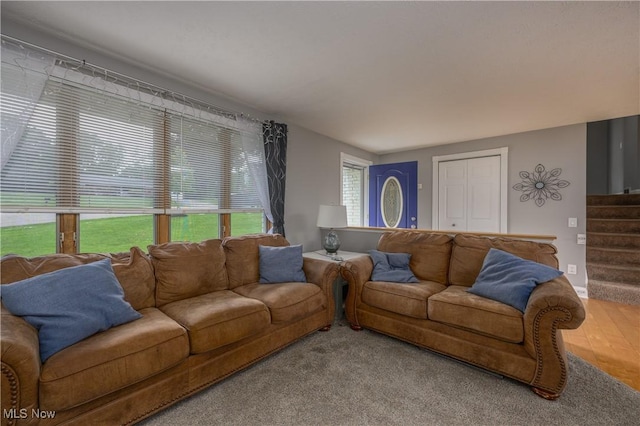 4184 Meadowview Dr NW, Canton, OH 44718 - living area featuring stairs and wood finished floors