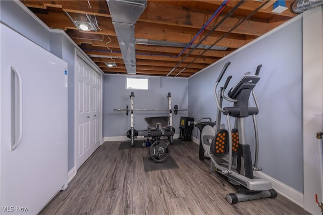 4184 Meadowview Dr NW, Canton, OH 44718 - workout area featuring wood finished floors and baseboards