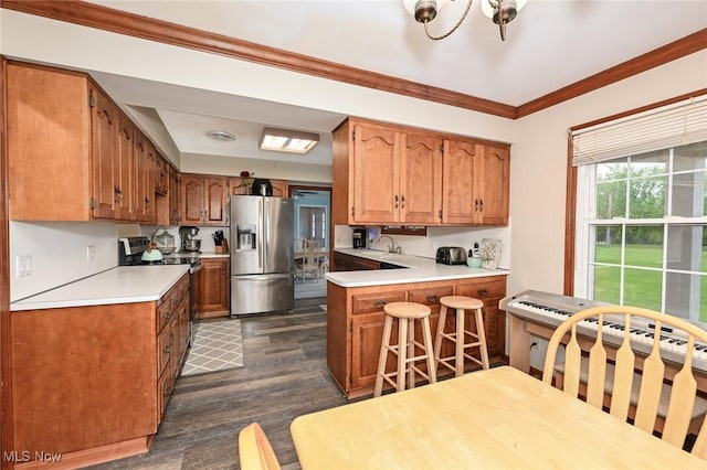 12115 Fowlers Mill Rd, Chardon, OH 44024 - kitchen featuring stainless steel fridge with ice dispenser, a peninsula, electric range oven, a sink, and dark wood-type flooring