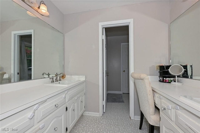 12115 Fowlers Mill Rd, Chardon, OH 44024 - full bath with vanity, tile patterned floors, and baseboards