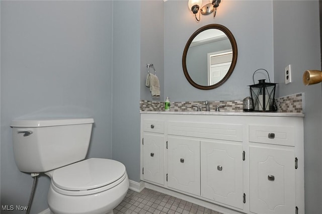 12115 Fowlers Mill Rd, Chardon, OH 44024 - half bathroom with toilet, backsplash, vanity, and tile patterned floors