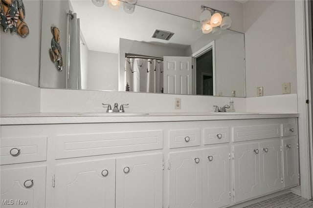 12115 Fowlers Mill Rd, Chardon, OH 44024 - full bath featuring double vanity and tile patterned floors