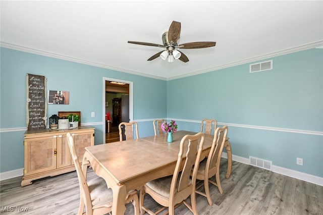 12115 Fowlers Mill Rd, Chardon, OH 44024 - dining room with a ceiling fan, light wood-style flooring, ornamental molding, and baseboards