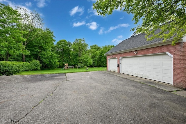 12115 Fowlers Mill Rd, Chardon, OH 44024 - garage with asphalt driveway