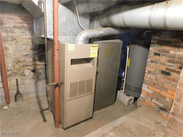 192 Walnut St, Geneva, OH 44041 - utility room featuring gas water heater