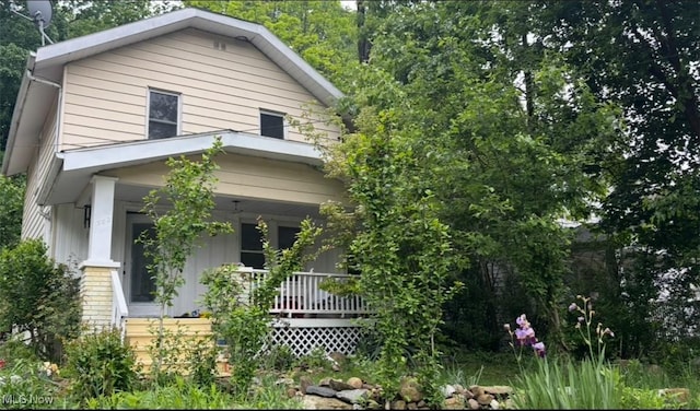 362 E Park Blvd, Akron, OH 44305 - view of front of house with covered porch and board and batten siding