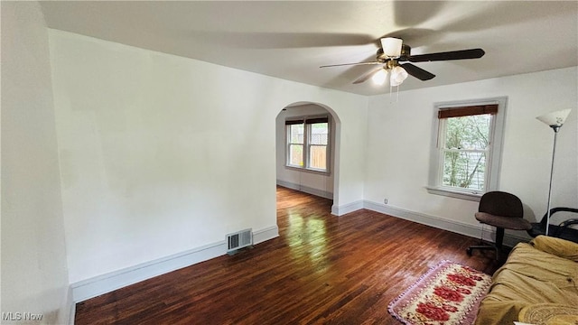 362 E Park Blvd, Akron, OH 44305 - home office featuring arched walkways, wood finished floors, ceiling fan, and baseboards