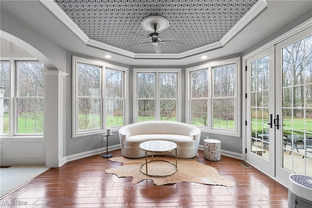 1014 Kings Ridge Blvd, Wadsworth, OH 44281 - sunroom featuring french doors, arched walkways, and healthy amount of natural light