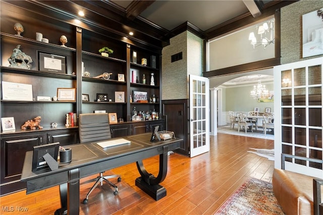 1014 Kings Ridge Blvd, Wadsworth, OH 44281 - office area with arched walkways, a chandelier, crown molding, wood finished floors, and beamed ceiling