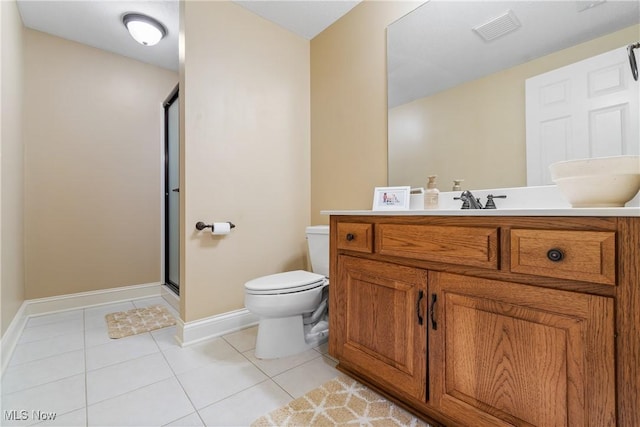 1014 Kings Ridge Blvd, Wadsworth, OH 44281 - full bath featuring toilet, vanity, tile patterned flooring, a stall shower, and baseboards