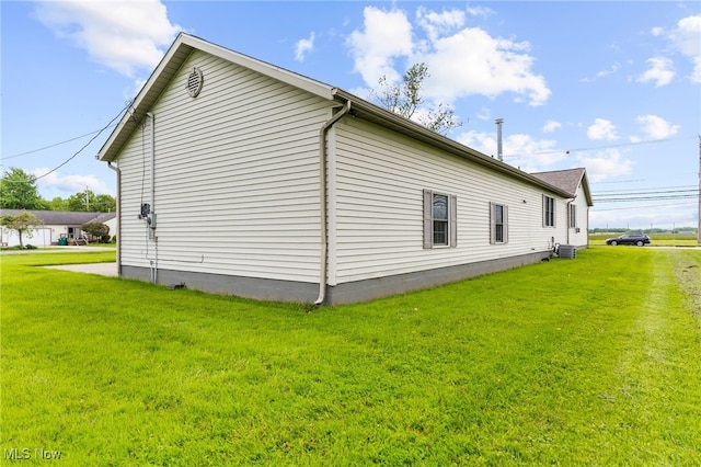 6937 Reynolds Rd, Mentor, OH 44060 - view of property exterior featuring a yard and cooling unit