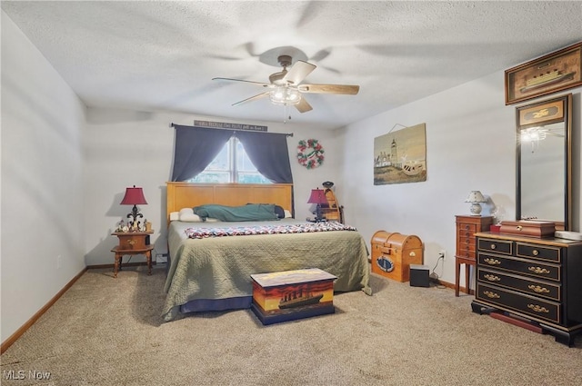 22010 Mountz Rd, Minerva, OH 44657 - carpeted bedroom with a textured ceiling, baseboards, and a ceiling fan