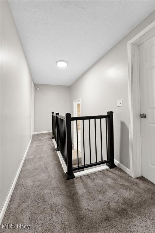 608 Arch St, Salem, OH 44460 - hall featuring carpet, an upstairs landing, and baseboards