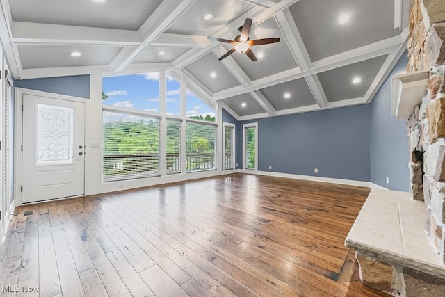 153 Cheyenne Trl, Malvern, OH 44644 - unfurnished living room with hardwood / wood-style floors, a ceiling fan, baseboards, and a fireplace