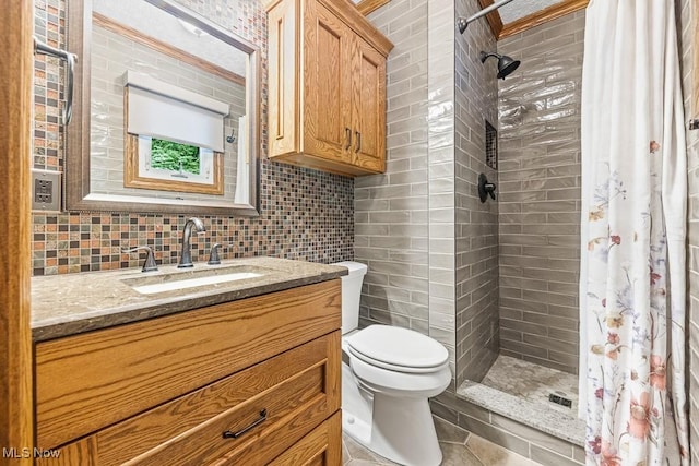 153 Cheyenne Trl, Malvern, OH 44644 - full bath featuring a tile shower, vanity, tasteful backsplash, and tile walls