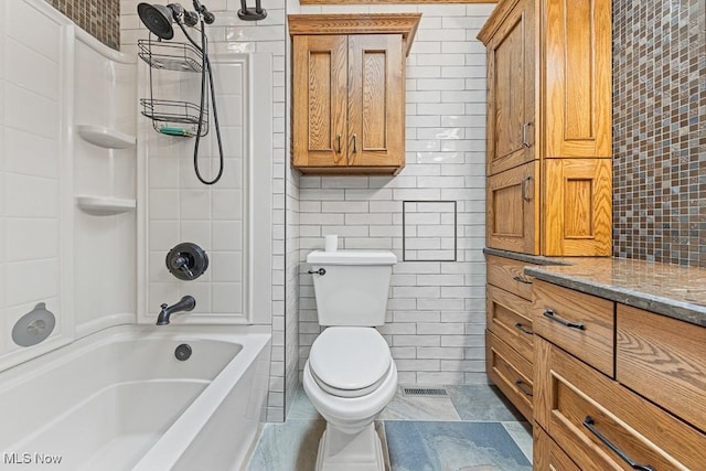 153 Cheyenne Trl, Malvern, OH 44644 - full bath with toilet, tile walls, and shower / tub combination