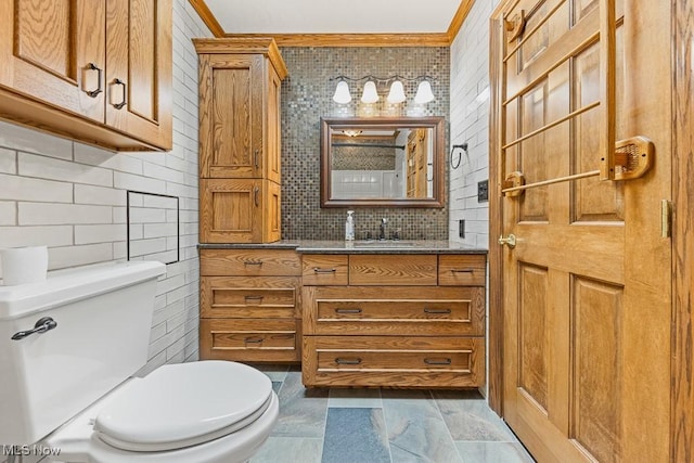 153 Cheyenne Trl, Malvern, OH 44644 - bathroom featuring vanity, tasteful backsplash, and ornamental molding