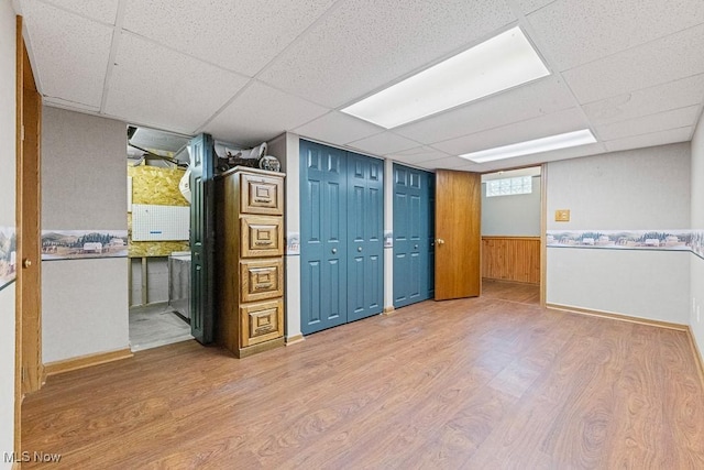 153 Cheyenne Trl, Malvern, OH 44644 - spare room with a drop ceiling, wood finished floors, and baseboards