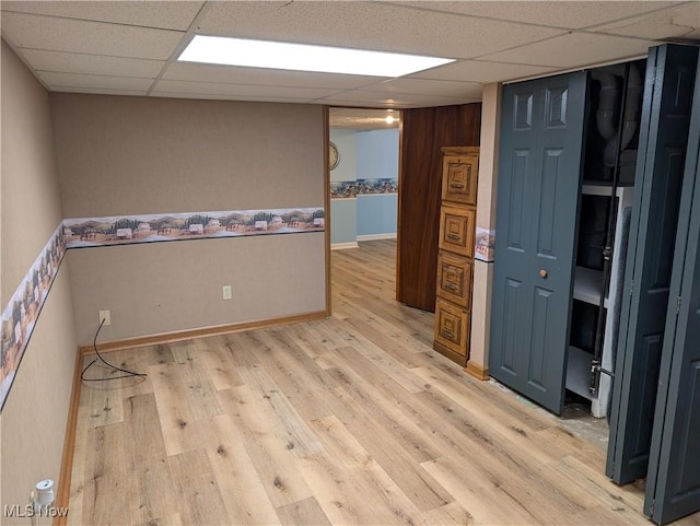 153 Cheyenne Trl, Malvern, OH 44644 - empty room with a paneled ceiling and light wood finished floors