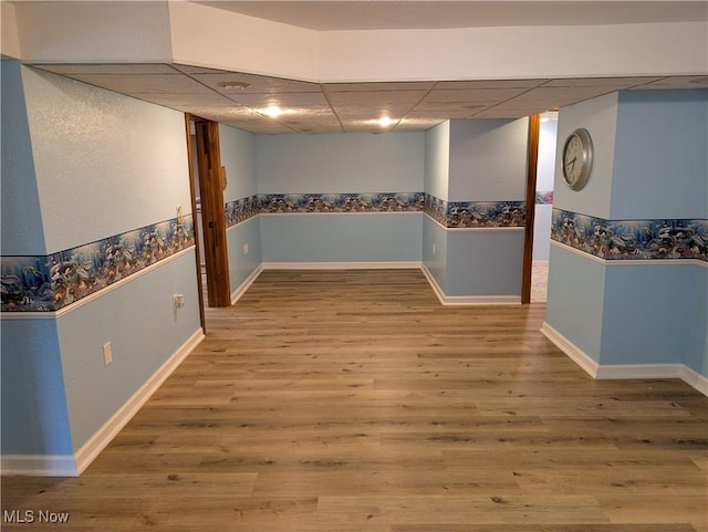 153 Cheyenne Trl, Malvern, OH 44644 - finished basement featuring a paneled ceiling and wood finished floors