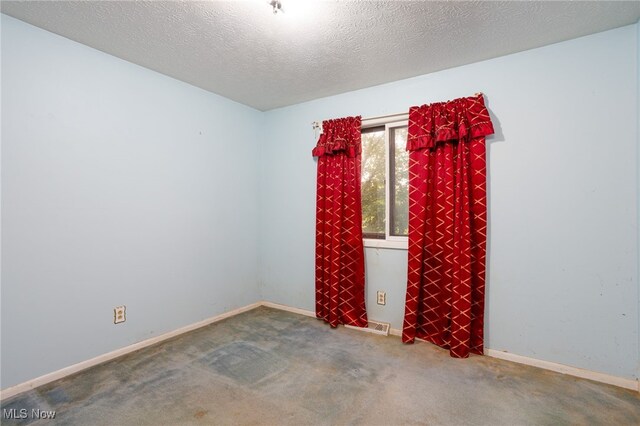 1580 S Hametown Rd, Copley, OH 44321 - carpeted empty room featuring a textured ceiling and baseboards