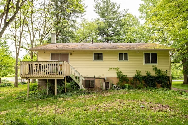 1580 S Hametown Rd, Copley, OH 44321 - rear view of house with a chimney and a deck