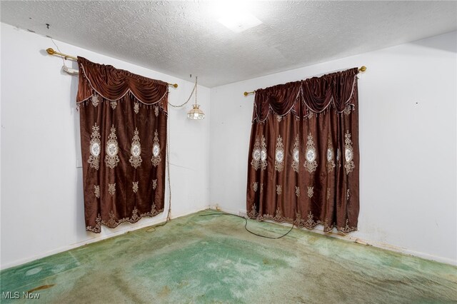 1580 S Hametown Rd, Copley, OH 44321 - carpeted empty room with a textured ceiling