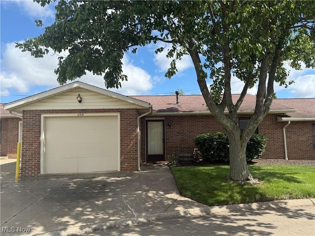2518 Portage Grove Ct, Wooster, OH 44691 - single story home with driveway, brick siding, and a garage