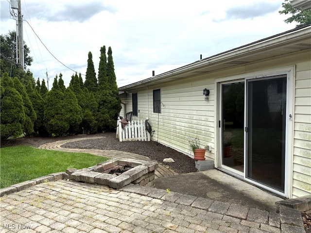 2518 Portage Grove Ct, Wooster, OH 44691 - view of patio featuring a fire pit