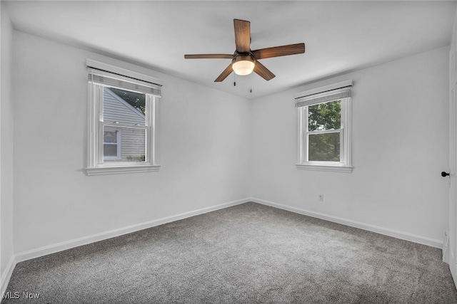 21650 Wilmore Ave, Euclid, OH 44123 - spare room with carpet flooring, ceiling fan, and baseboards