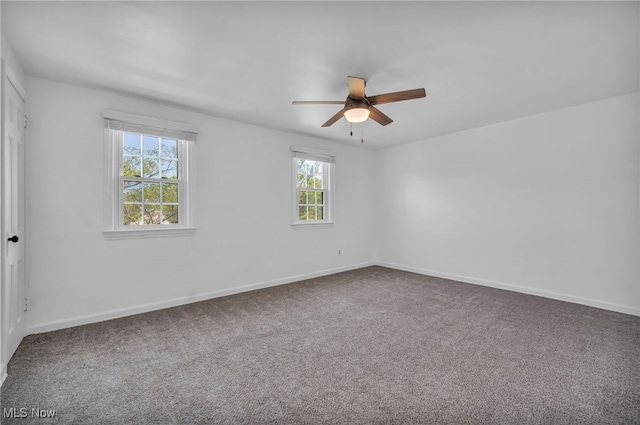 21650 Wilmore Ave, Euclid, OH 44123 - carpeted empty room featuring a ceiling fan and baseboards