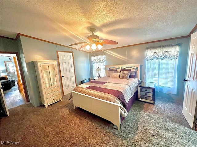 115 Rhodes Ave, Dillonvale, OH 43917 - bedroom featuring ornamental molding, carpet flooring, multiple windows, a textured ceiling, and a ceiling fan