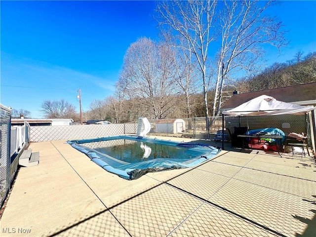 115 Rhodes Ave, Dillonvale, OH 43917 - view of pool featuring a fenced backyard, a patio, and a water slide