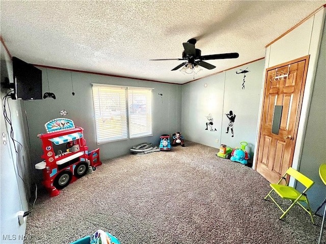 115 Rhodes Ave, Dillonvale, OH 43917 - playroom featuring carpet flooring, ceiling fan, a textured ceiling, and crown molding