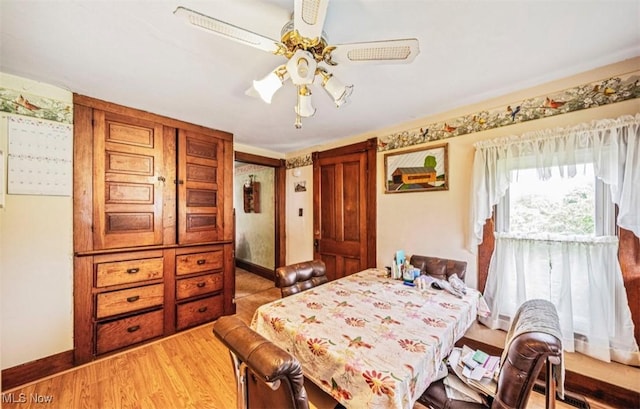 1092 State Route 46 N, Jefferson, OH 44047 - dining space featuring ceiling fan, light wood-style flooring, and baseboards