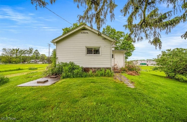 1092 State Route 46 N, Jefferson, OH 44047 - view of home's exterior featuring a yard