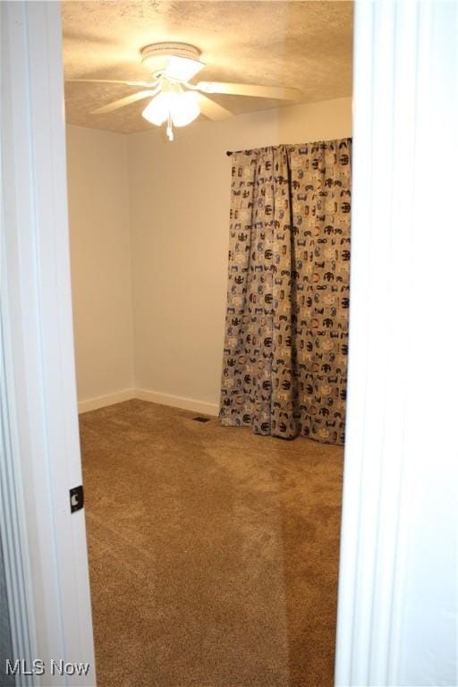 504 Williams Ave, East Liverpool, OH 43920 - carpeted empty room featuring ceiling fan and baseboards