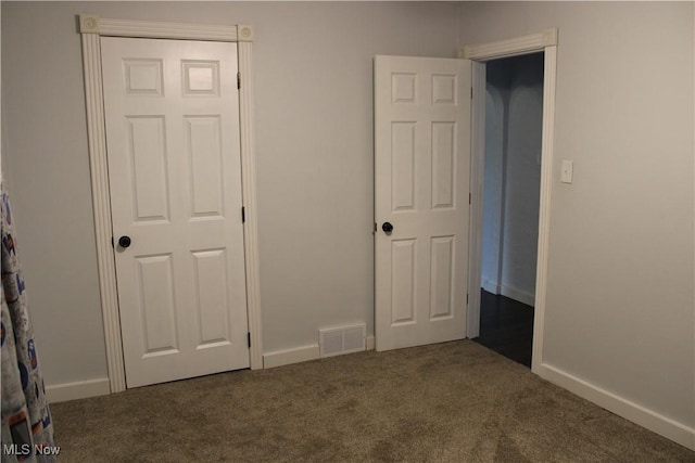 504 Williams Ave, East Liverpool, OH 43920 - unfurnished bedroom featuring carpet flooring and baseboards