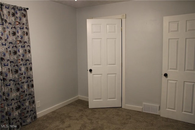 504 Williams Ave, East Liverpool, OH 43920 - unfurnished bedroom with carpet and baseboards