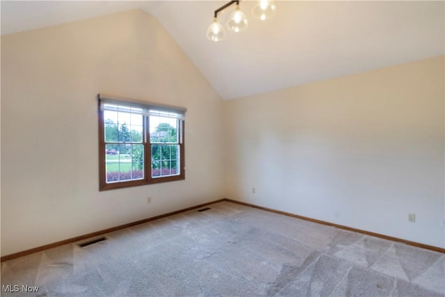 28420 Glen Hollow Ln, Olmsted Falls, OH 44138 - empty room featuring carpet floors, lofted ceiling, and baseboards