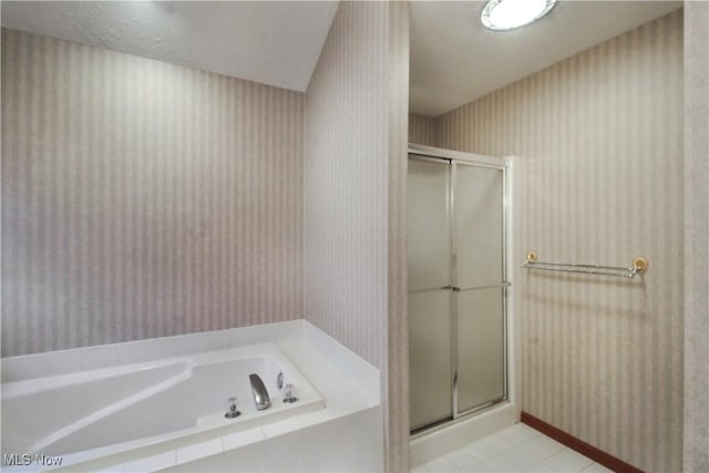 28420 Glen Hollow Ln, Olmsted Falls, OH 44138 - full bathroom with wallpapered walls, a shower stall, a bath, tile patterned flooring, and baseboards